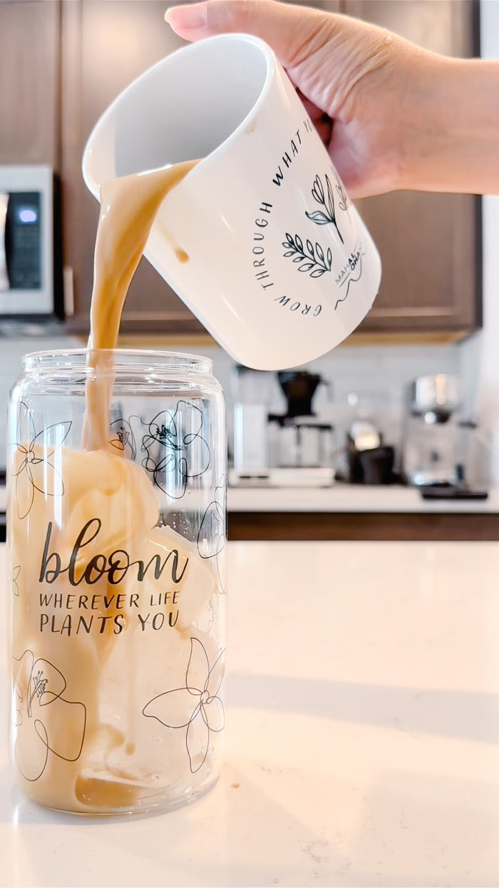 Ice Coffee pouring into a glass tumbler